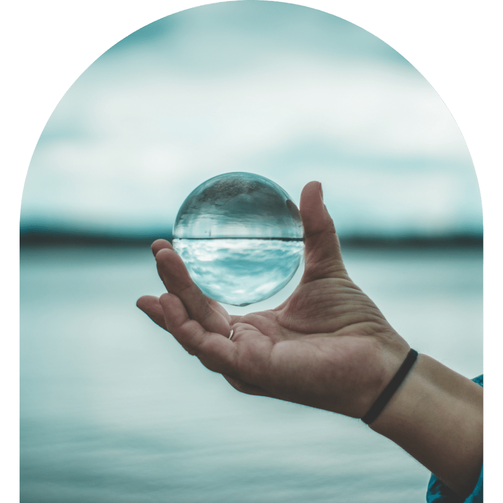 hand holding split level glass ball