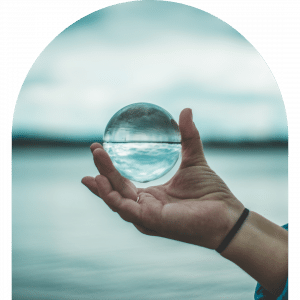 hand holding split level glass ball